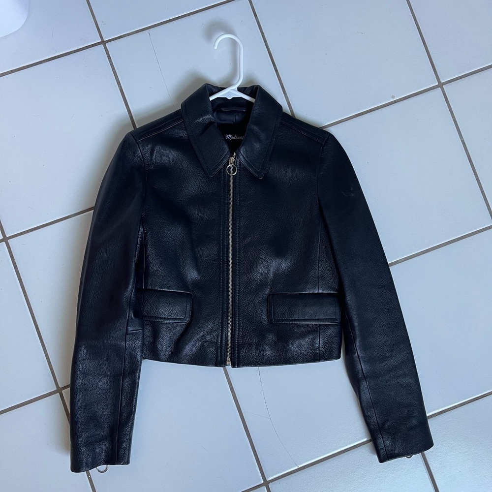 Shrunken zip front jacket in leather